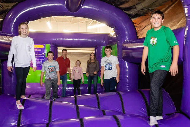 Combined view of kids playing in the Inflatable Airpark and playing Laser Tag at XtremeCraze Foxborough