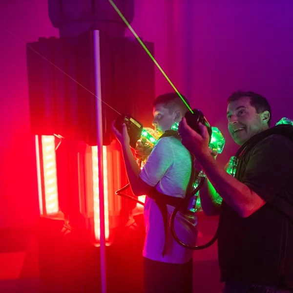 Combined view of kids playing in the Inflatable Airpark and playing Laser Tag at XtremeCraze Foxborough